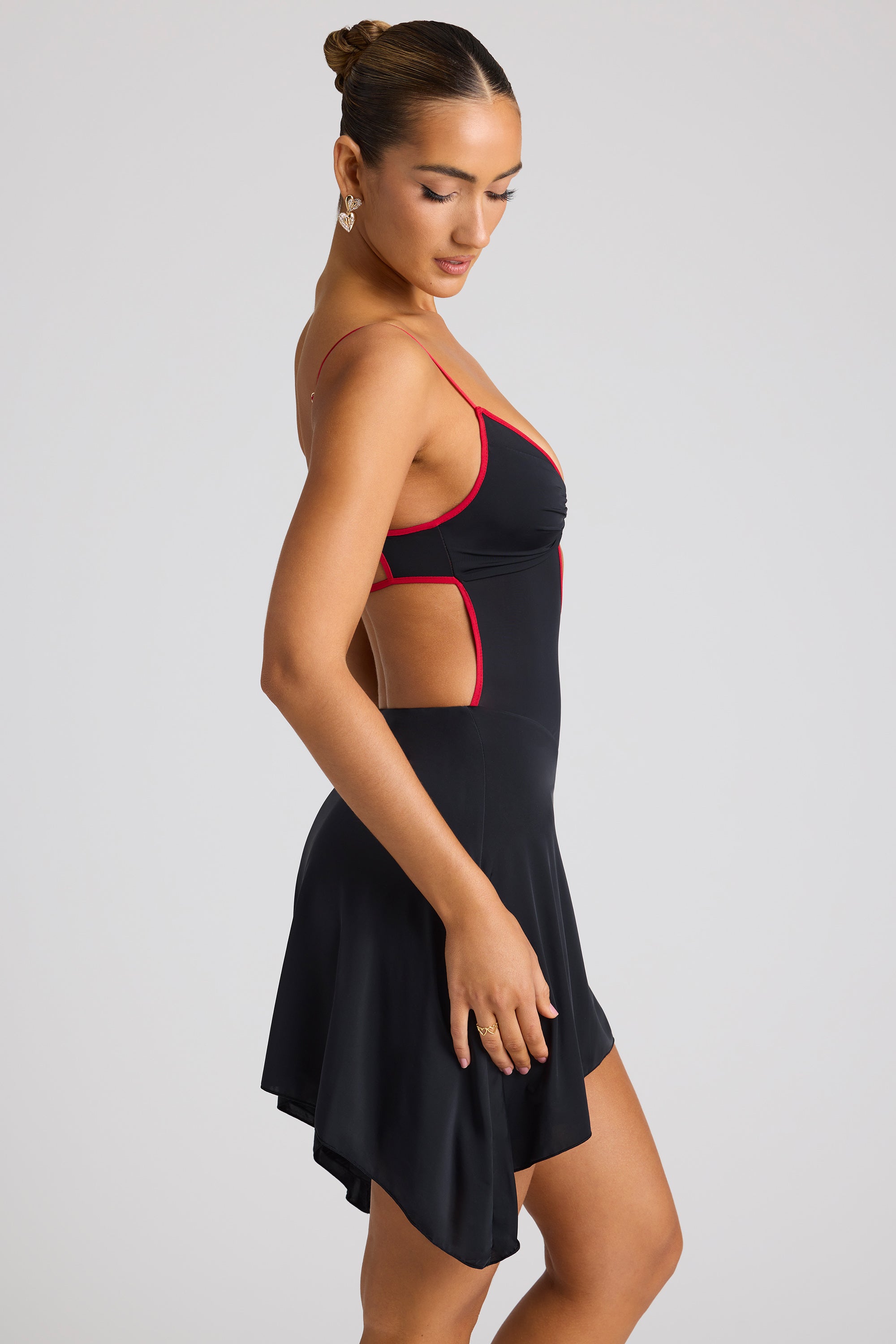 contrast binding mini dress in black Nike One Training one-shoulder mini dress with contrast binding in black