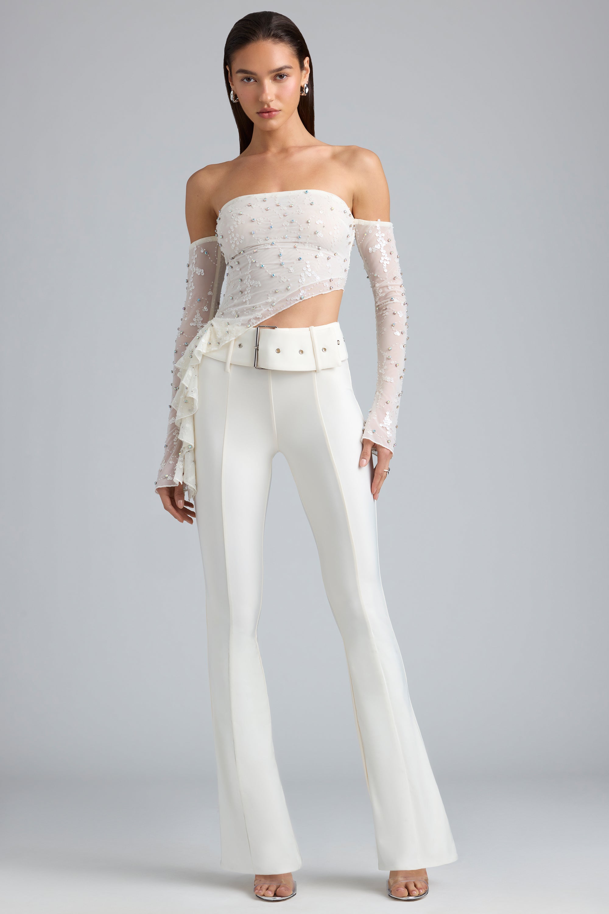 Gia Metallic Belted Mid-Rise Flared Trousers in Ivory | Oh Polly