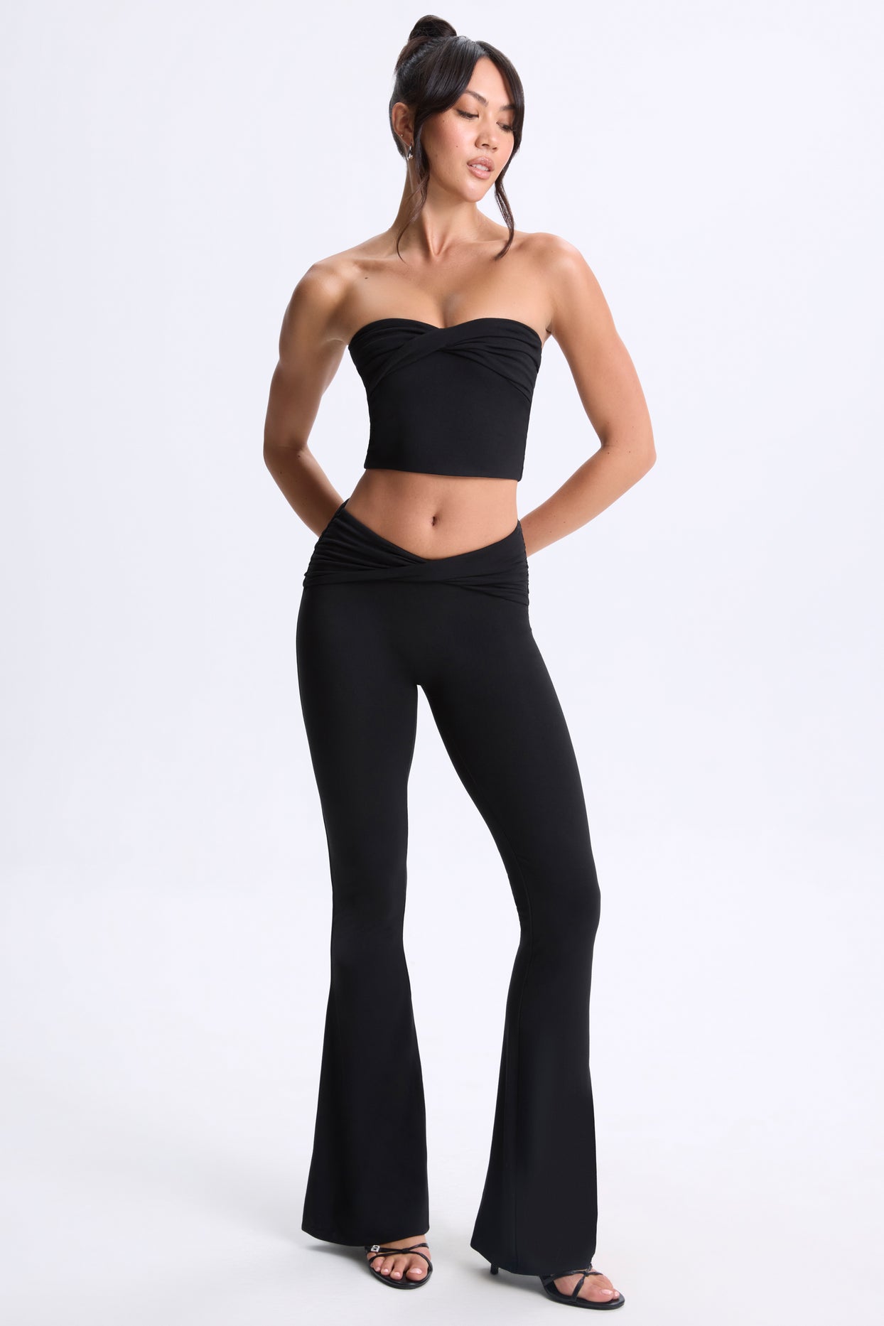 Petite Twist-Front Flared Trousers in Black