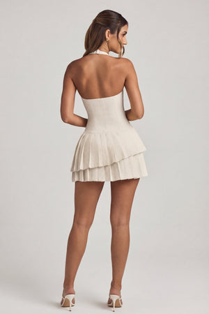 Oh Polly's Freya Tidy wearing the Rosaria Mini Dress in Ivory Tweed fabric perfect for spring garden parties