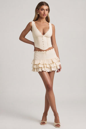 Oh Polly's Freya Tidy wearing the Lorena Mini Skirt in Ivory Stretch Woven fabric perfect for summer brunches