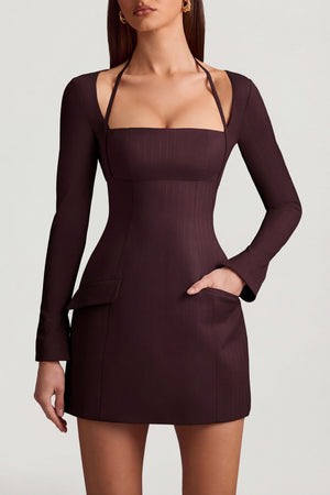 Oh Polly's Anna wearing the Ksenia Mini Dress in Chocolate Brown Stretch Woven fabric perfect for cocktail parties