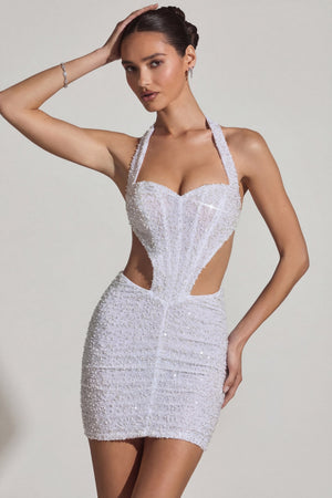 Oh Polly's Anna wearing the Lucia Mini Dress in White Embellished, Mesh fabric perfect for summer garden parties
