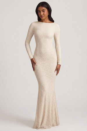 Oh Polly's Yarelis wearing the Tarini Maxi Dress in Ivory Stretch Lace fabric perfect for summer garden parties