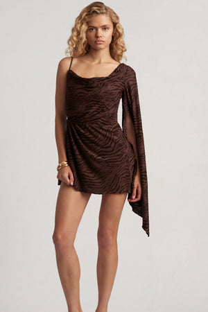 Oh Polly's Juliana Nulu wearing the Angelie Mini Dress in Dark Chocolate Burn Out Jersey fabric perfect for a night out