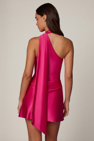 Oh Polly's Roberta wearing the Kiraz Mini Dress in Hot Pink Satin Jersey fabric perfect for summer parties