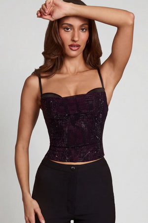 Oh Polly's Yasmin wearing the Armelia Full Top in Purple Snake Square Hotfix fabric perfect for a night out