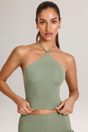 Oh Polly model Yasmin wearing the Aviora Full Top in Sage Green Modal fabric perfect for coffee shop outings