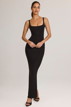 Oh Polly model Yasmin wearing the Soreia Maxi Dress in Black Modal fabric perfect for evening events