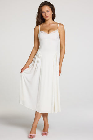 Oh Polly model Georgia wearing the Livia Midaxi Dress in White Modal fabric perfect for summer garden parties