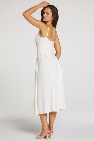 Oh Polly model Georgia wearing the Livia Midaxi Dress in White Modal fabric perfect for romantic getaways