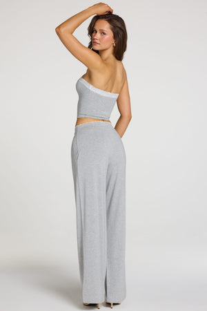 Oh Polly model Georgia wearing the Reina Trousers in Grey Marl Modal fabric perfect for shopping with friends