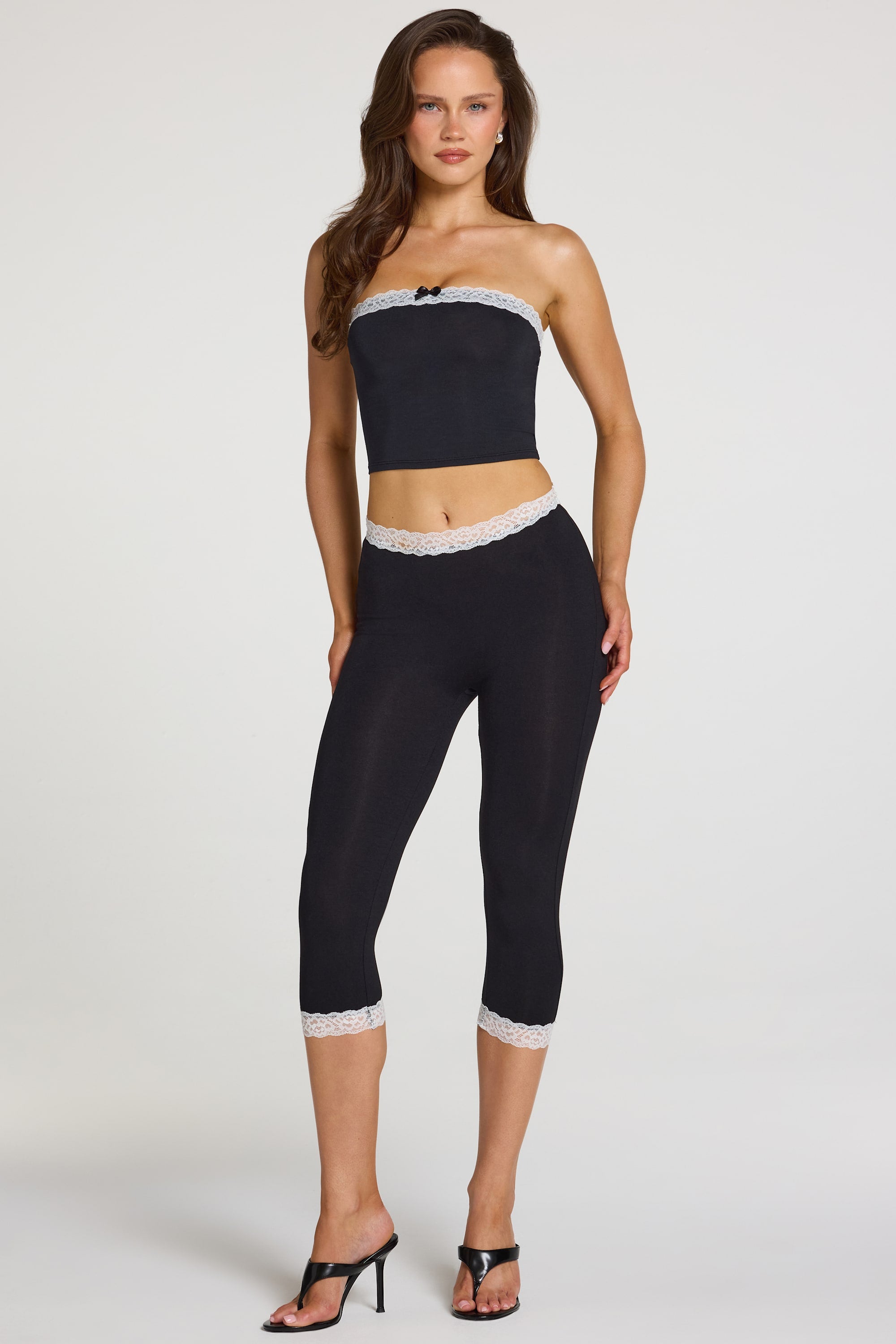 Modal Lace-Trim Mid-Rise Capri Leggings in Black - 1
