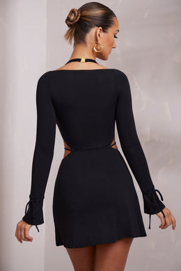 Mini-robe trapèze découpée à manches longues en noir