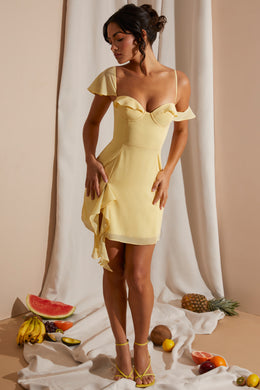 Asymetryczna drapowana mini sukienka w kolorze żółtym
