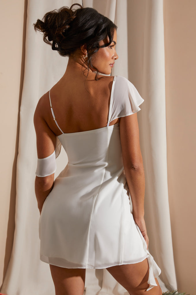 Mini-robe asymétrique drapée en blanc