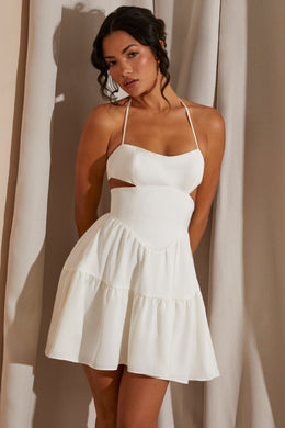 Mini-robe découpée à col licou en blanc