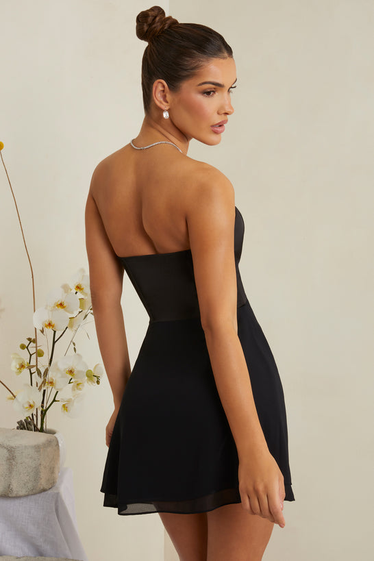 Gorsetowa mini sukienka bez ramiączek z głębokim dekoltem w kolorze czarnym