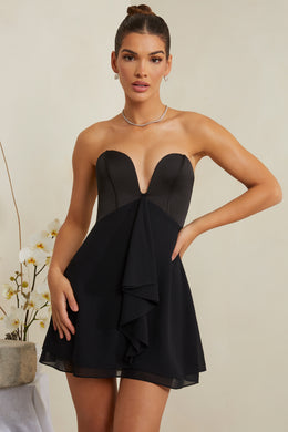 Mini-robe corset sans bretelles à décolleté plongeant en noir