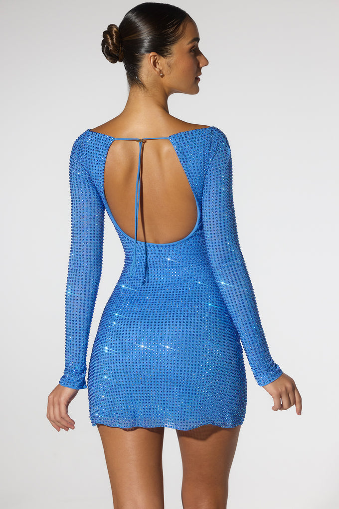Ozdobiona gorsetowa sukienka mini z długim rękawem i odkrytymi plecami w kolorze kobaltowym