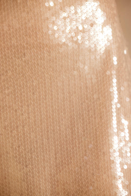 Przezroczysta, cekinowa spódnica mini ze średnim stanem i rozcięciem z boku w kolorze jasnobrązowym
