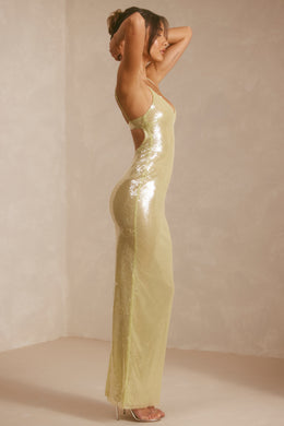 Przezroczysta, cekinowa suknia wieczorowa z wycięciem na plecach i dekoltem w kształcie litery V w kolorze pistacjowym