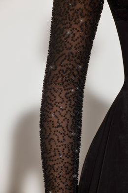 Mini-robe ornée à manches longues et ourlet incliné en noir