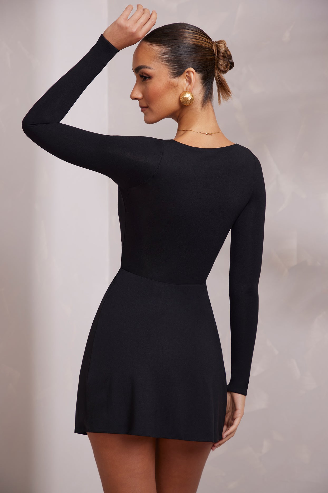 Long Sleeve Plunge Neck Wrap Over  Mini Dress in Black