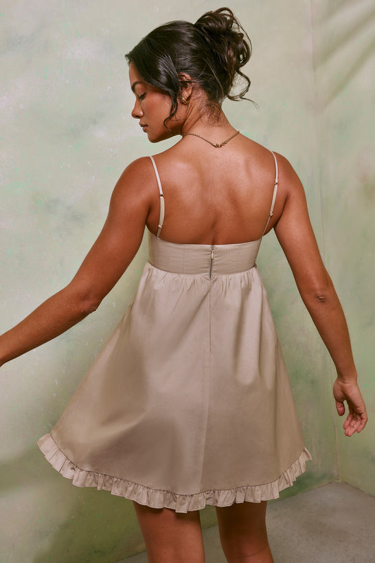 Mini-robe trapèze en coton taille empire en sable