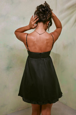 Mini-robe trapèze en coton taille empire en noir