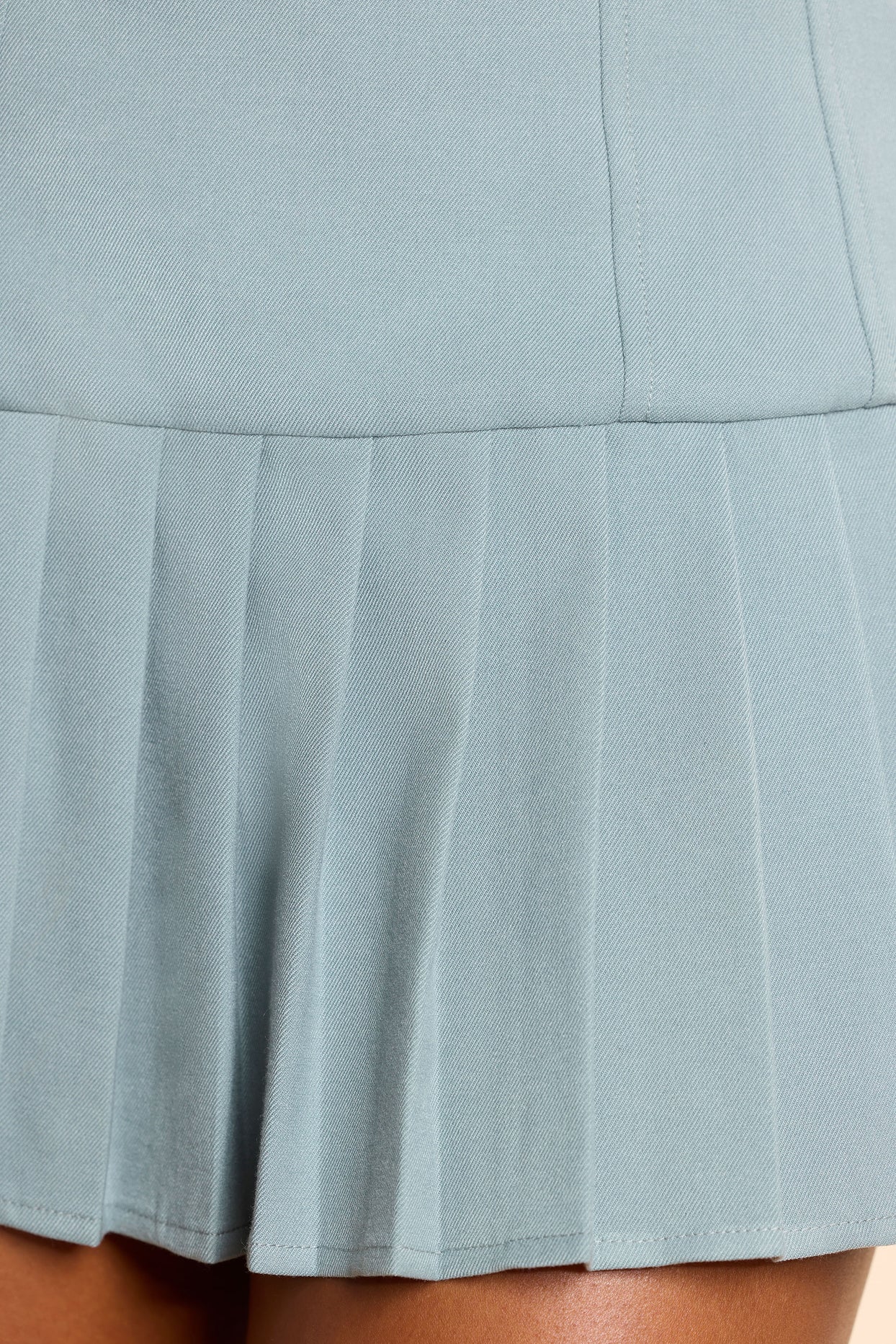 Brushed Twill Drop Waist Kilt Mini Dress in Stone Blue