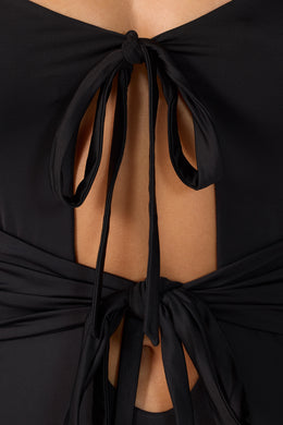 Mini-robe découpée à manches longues en jersey moulant en noir