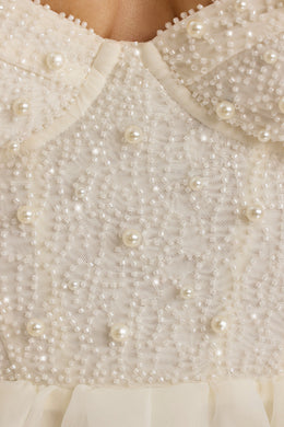 Gorsetowa sukienka maxi z organzy w kolorze białym