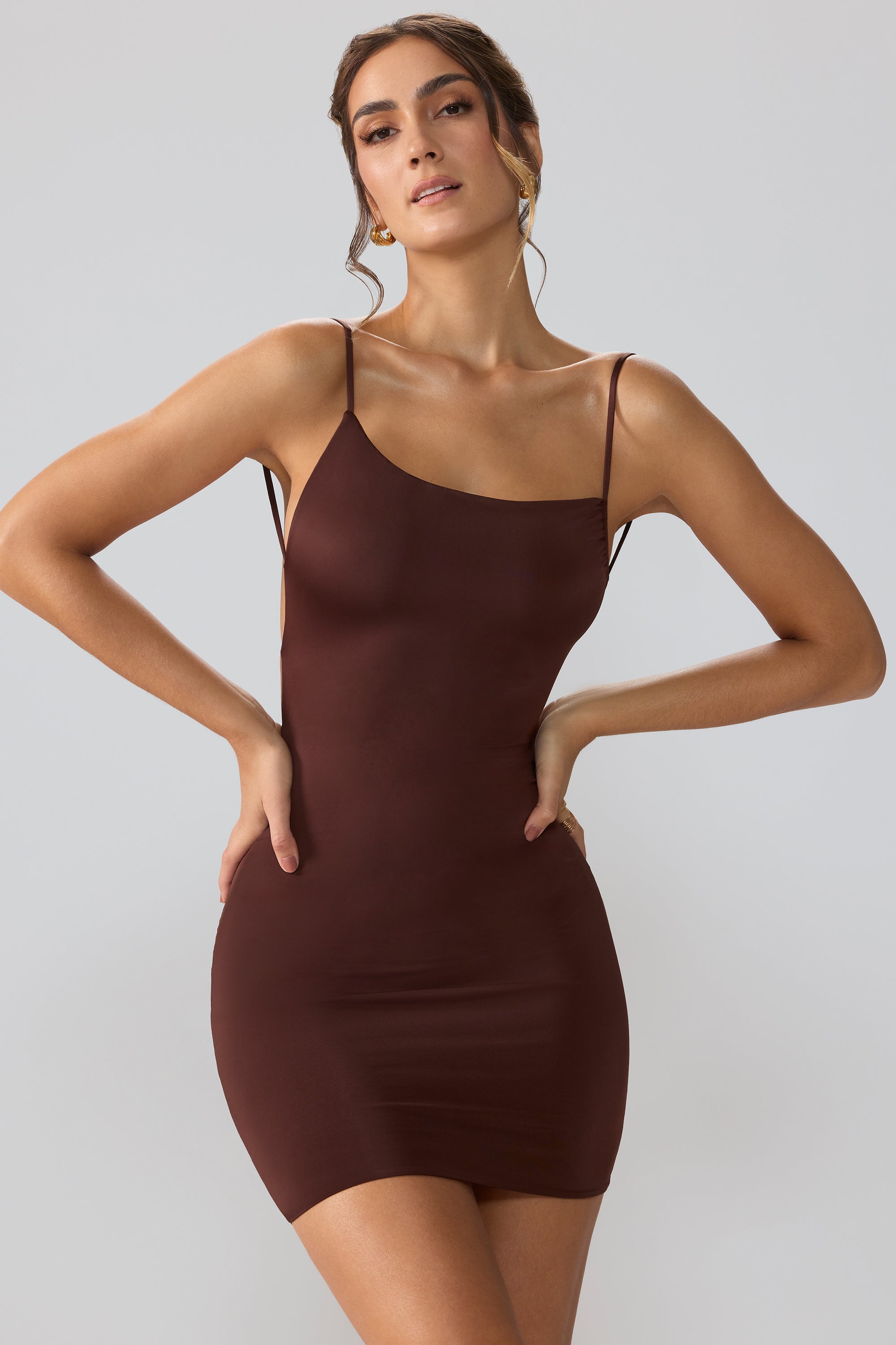 Orli Slinky Jersey Asymmetric Neckline Open Back Mini Dress in Brown