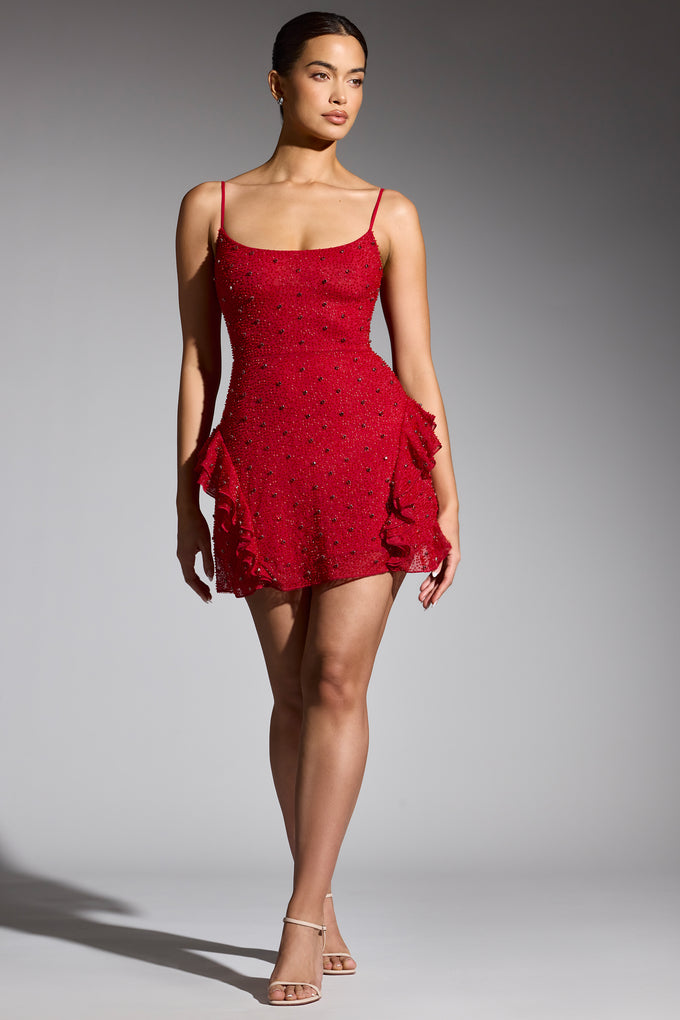 Mini-robe ornée à volants en rouge