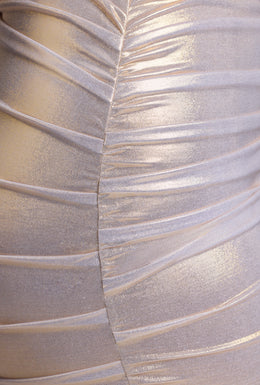 Mini-robe asymétrique en jersey métallisé en or clair