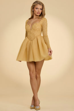 Tiulowa sukienka mini z głębokim dekoltem w kolorze złotym