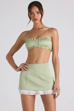 Mini-jupe plissée taille moyenne en vert printemps