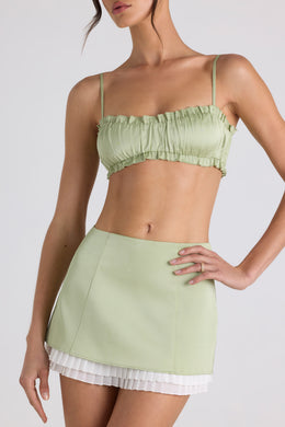 Mini-jupe plissée taille moyenne en vert printemps