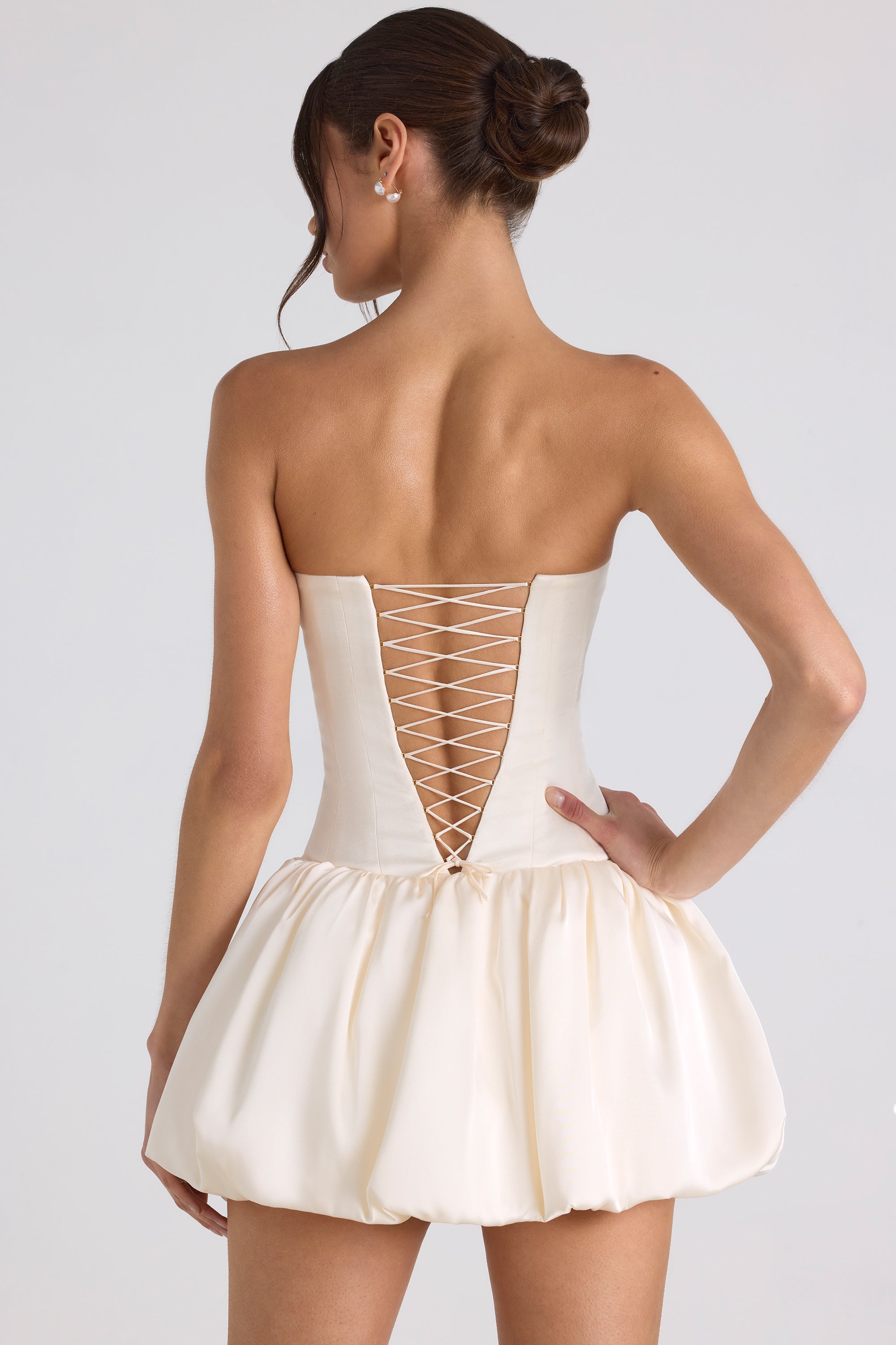 Fabiola Lace-Up Bubble Hem Corset Mini Dress in Ivory