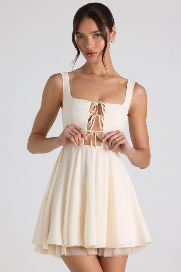 Tie-Detail A-Line Micro Mini Dress in Ivory - 1