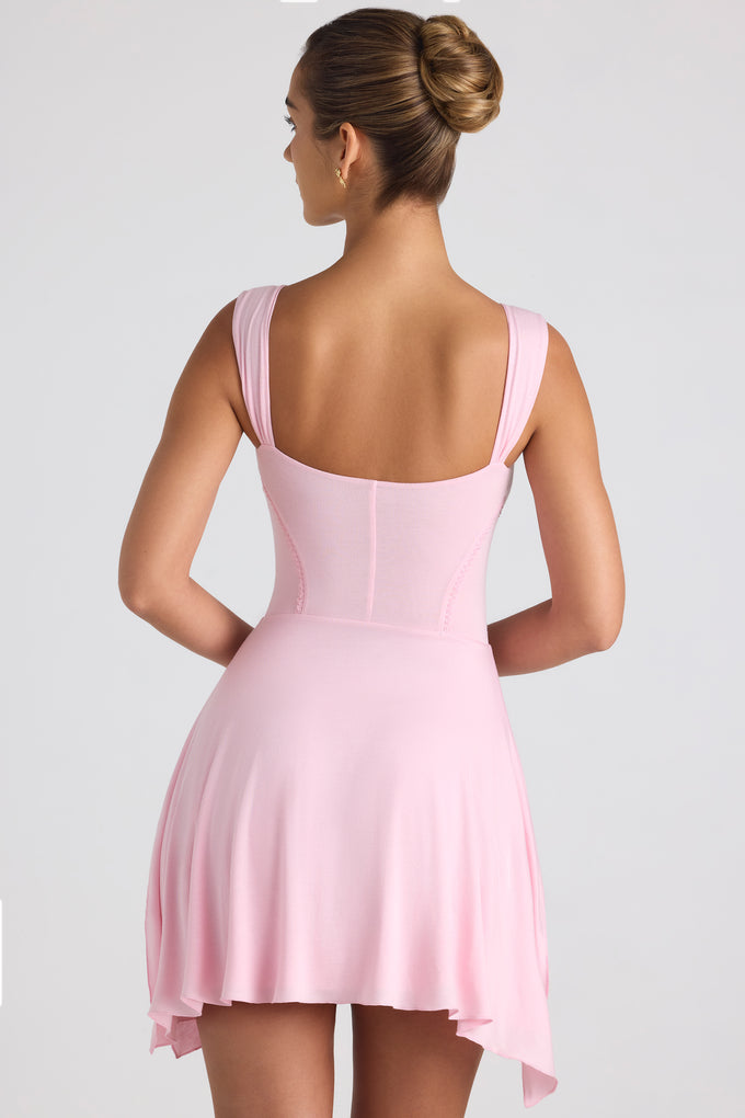 Mini-robe à ourlet asymétrique en rose tendre