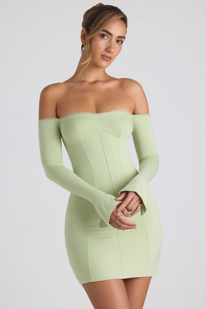Mini sukienka Godet z długim rękawem i odkrytymi ramionami w kolorze wiosennej zieleni