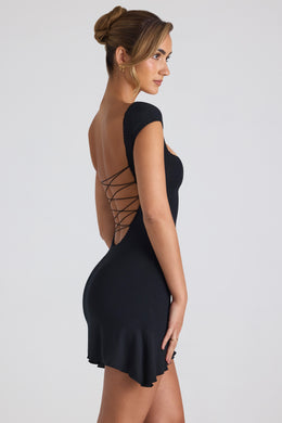 Mini-robe à ourlet asymétrique et bordure en dentelle, dos lacé, noir