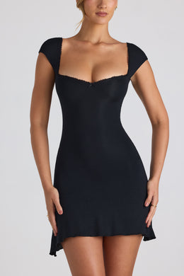 Mini-robe à ourlet asymétrique et bordure en dentelle, dos lacé, noir