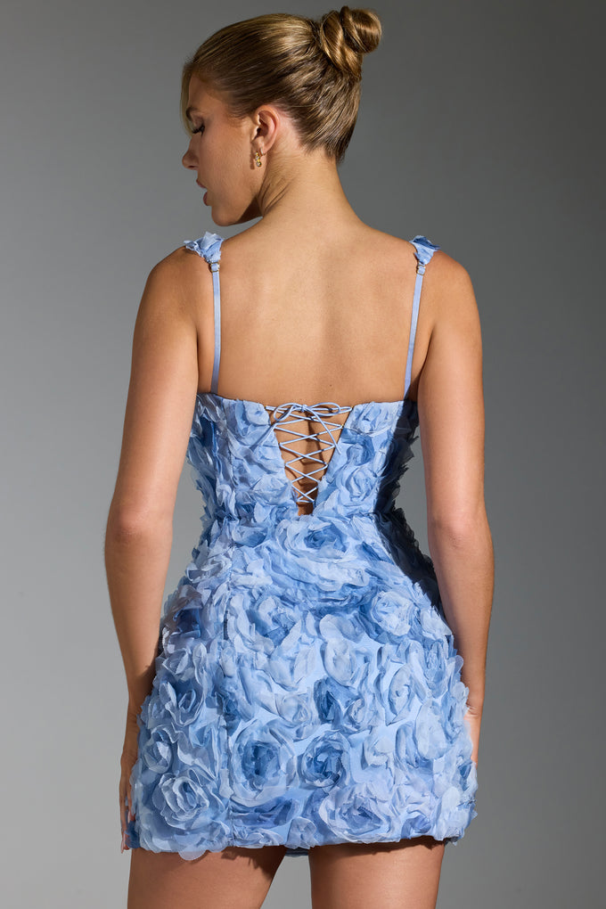 Niebieska gorsetowa sukienka mini z kwiatowymi aplikacjami