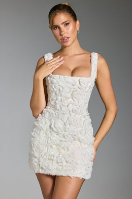 Biała sukienka mini z gorsetem i kwiatowymi aplikacjami