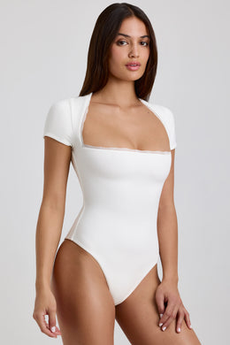 Ribbed Modal Lace-Trim Bodysuit in White