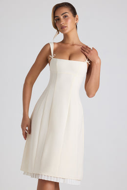 Bow-Embellished Pleated A-Line Midi Dress in Ivory
