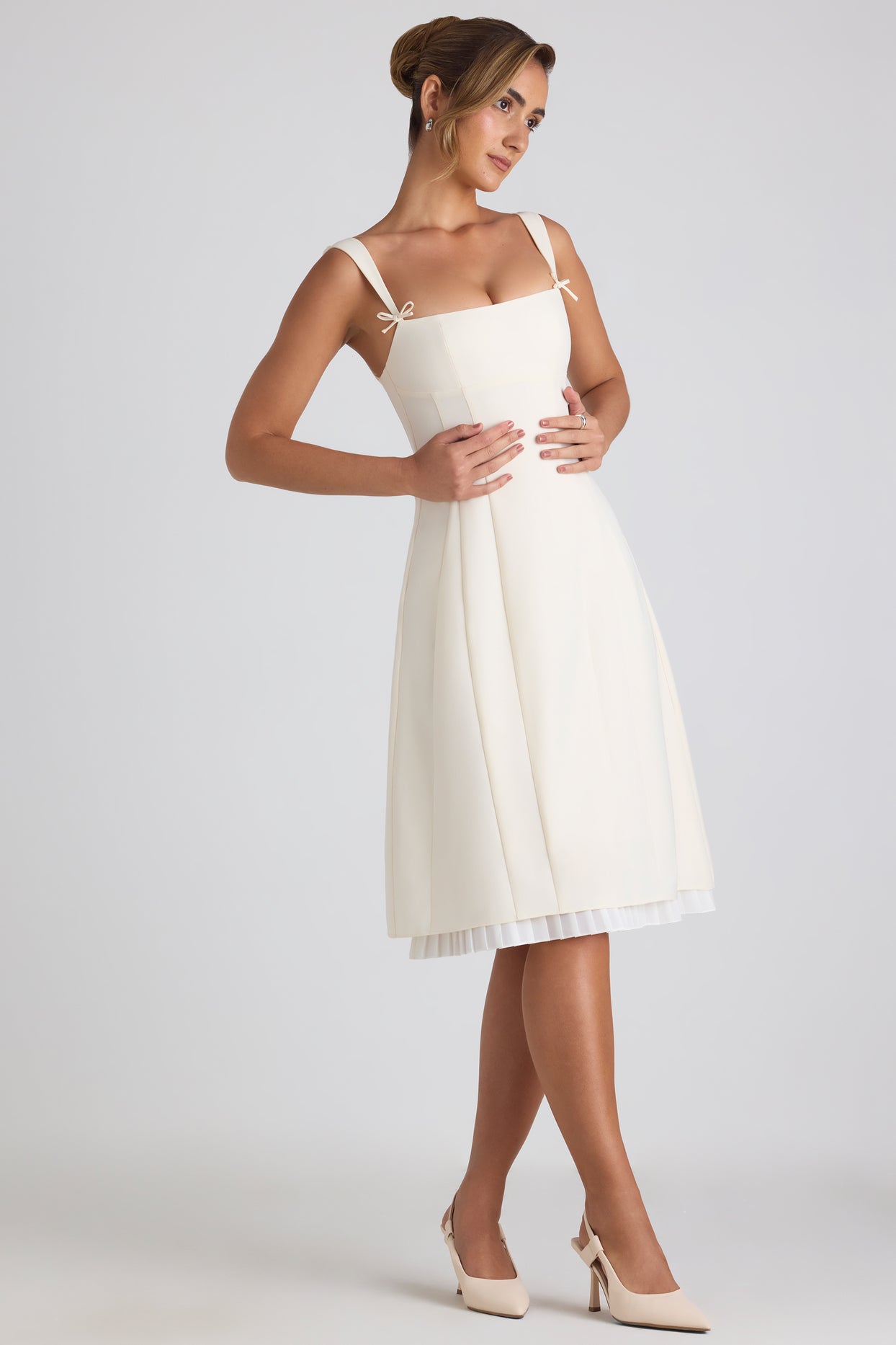 Bow-Embellished Pleated A-Line Midi Dress in Ivory